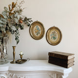 Pair of Antique Oval Floral Paintings