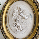 Pair of Vintage Oval Cherub Reliefs in Gilt Frame