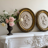 Pair of Vintage Oval Cherub Reliefs in Gilt Frame